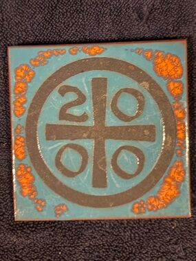 Handmade Blue and Orange Ceramic Tile with Geometric Motif
